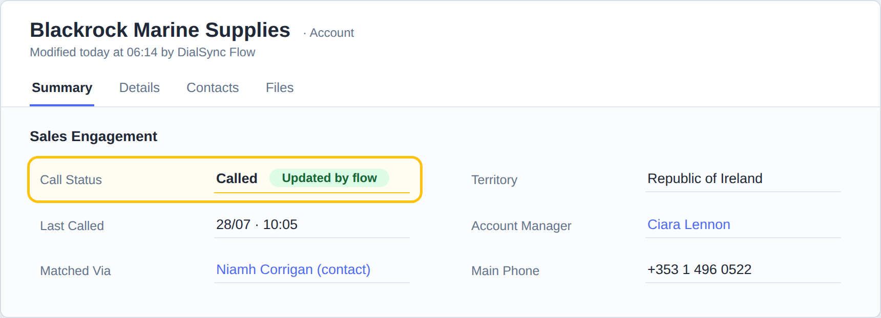 Cropped Dynamics 365 account form section with the call-status field set to Called, highlighted with a yellow ring and an Updated by flow badge